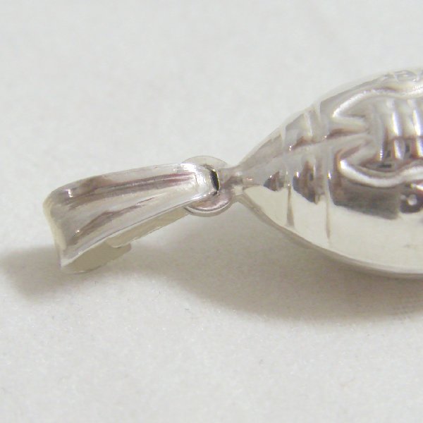 (p1299)Silver pendant in motif Rugby football.